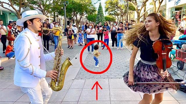 1-year-old baby joins "dance monkey" | street performance - karolina protsenko & daniele vitale sax 1-year-old baby joins "dance monkey" | street performance - karolina protsenko & daniele vitale sax