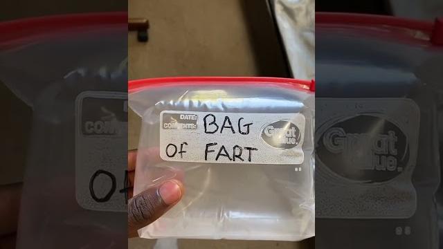 Smelling a bag of fart Smelling a bag of fart