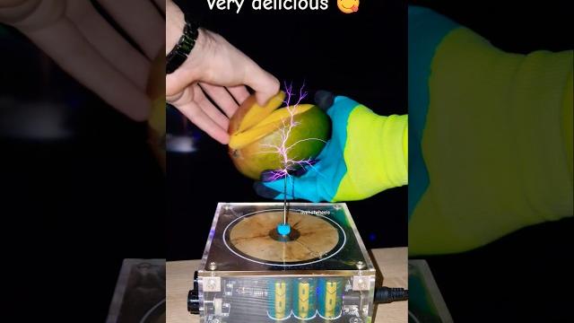 Mix: lightning mango and tesla coil #shorts #fruit #science Mix: lightning mango and tesla coil #shorts #fruit #science