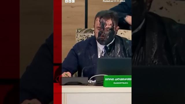 Moment georgia election chief doused in paint by opposition official. #georgia #bbcnews Moment georgia election chief doused in paint by opposition official. #georgia #bbcnews
