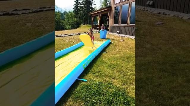 Cute twin girls playing super slip n slide #outdooractivities #shorts #twingirls #slipnslide #short Cute twin girls playing super slip n slide #outdooractivities #shorts #twingirls #slipnslide #short