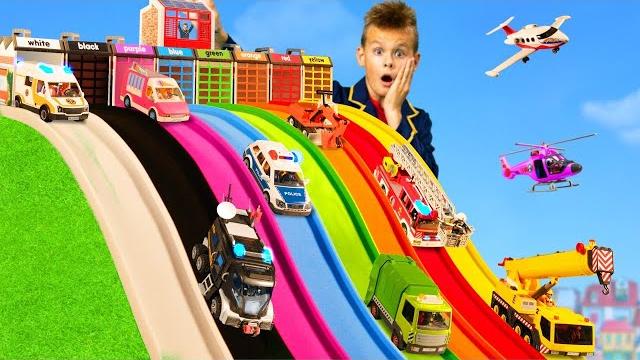 The kids play with toy cars and slides The kids play with toy cars and slides