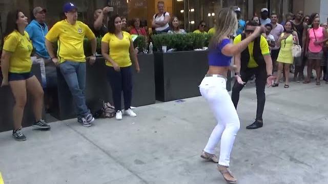 Brazilian girl dances a brazilian samba street dance at brazilian carnival culture party new york Brazilian girl dances a brazilian samba street dance at brazilian carnival culture party new york