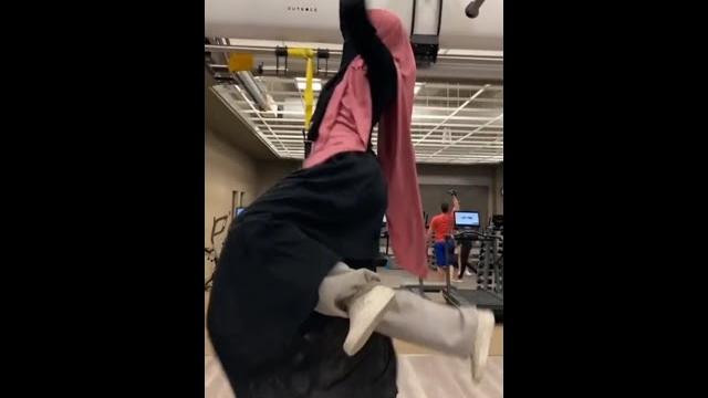 Arab hijab girl doing hard exercise Arab hijab girl doing hard exercise