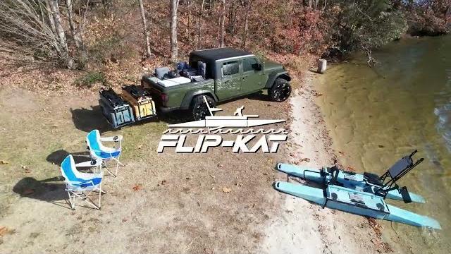The flip-kat by noisy river outdoors The flip-kat by noisy river outdoors