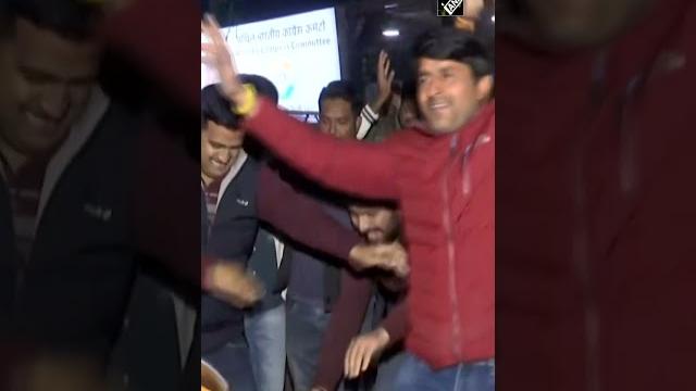 Delhi: congress workers celebrate outside aicc office after the party wins the hp assembly election Delhi: congress workers celebrate outside aicc office after the party wins the hp assembly election
