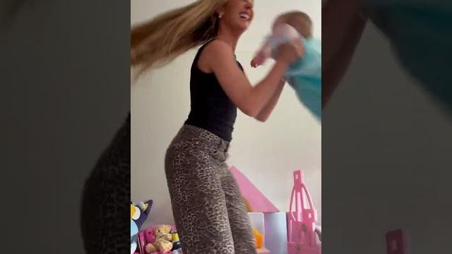 Little girl struggles to stand after getting spun Little girl struggles to stand after getting spun