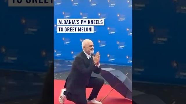 Albania’s pm kneels to greet italy’s Albania’s pm kneels to greet italy’s