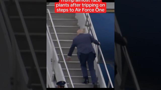 Trump trips on air force one steps, nearly face plants Trump trips on air force one steps, nearly face plants