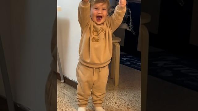 Toddler figures out how to give a thumbs up #shorts Toddler figures out how to give a thumbs up #shorts