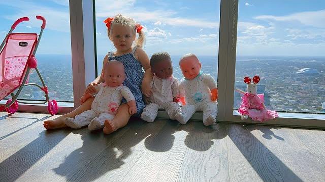 Naomi entertains her baby dolls Naomi entertains her baby dolls