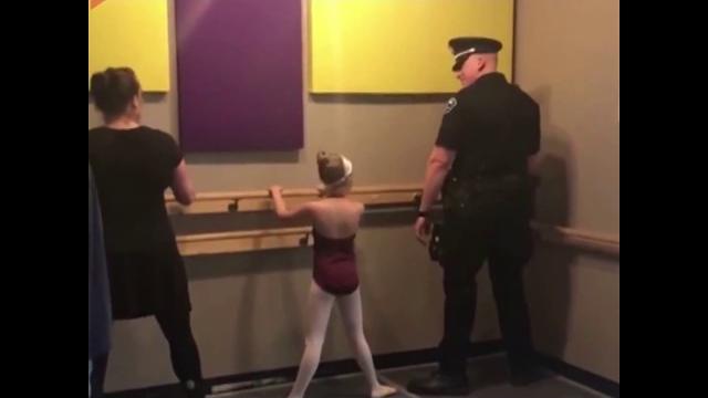 Police officer takes ballet class with daughter Police officer takes ballet class with daughter