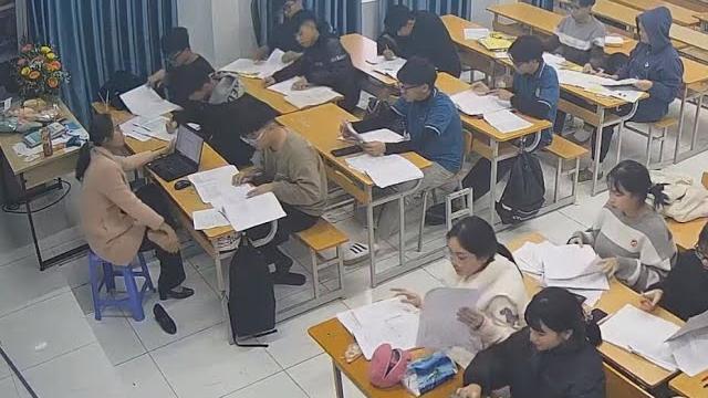 The teacher remove heels relax her tired feet The teacher remove heels relax her tired feet