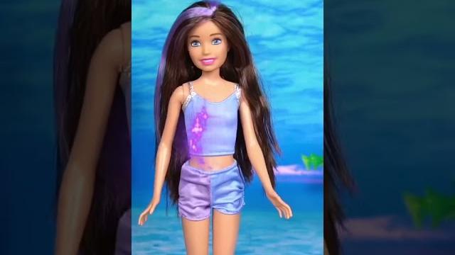 Barbie dolls turning into mermaids Barbie dolls turning into mermaids