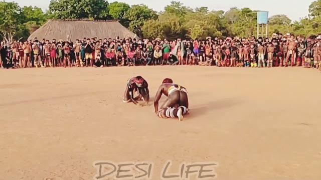 Luta huka-huka: the sacred wrestling ritual of the kuikuro tribe | kuarup festival in xingu-mt Luta huka-huka: the sacred wrestling ritual of the kuikuro tribe | kuarup festival in xingu-mt