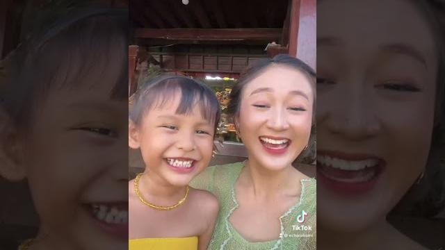 Balinese mother asks for money Balinese mother asks for money