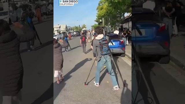 San diego locals chant "shame" at ice during raid San diego locals chant "shame" at ice during raid