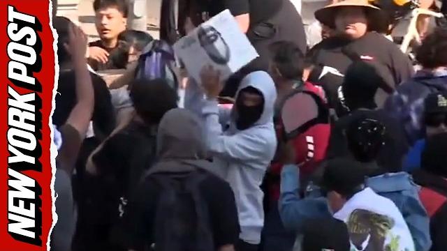 Anti-ice rioters caught-on-camera handing out tactical gear and masks in clash with cops Anti-ice rioters caught-on-camera handing out tactical gear and masks in clash with cops