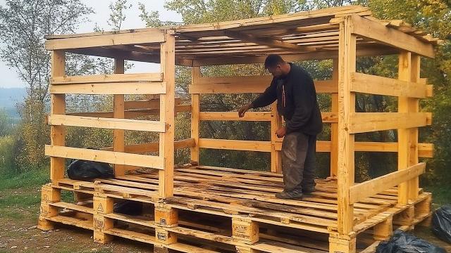 Man builds a house with abandoned pallets in the middle of the forest | by @lesnoy_craft8607 Man builds a house with abandoned pallets in the middle of the forest | by @lesnoy_craft8607