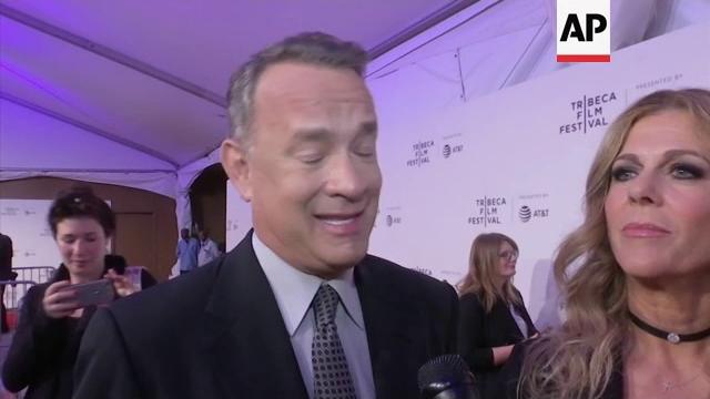 Tom hanks, emma watson walk tribeca red carpet for 'circle' world premiere; hanks remembers jonathan Tom hanks, emma watson walk tribeca red carpet for 'circle' world premiere; hanks remembers jonathan