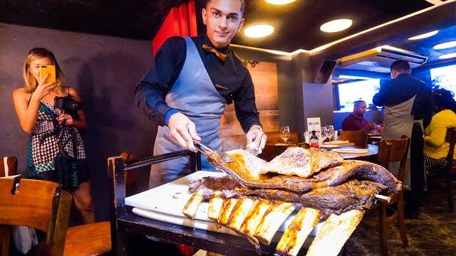 Brazilian steakhouse - huge beef ribs + 14 meats churrascaria in rio de janeiro, brazil! Brazilian steakhouse - huge beef ribs + 14 meats churrascaria in rio de janeiro, brazil!