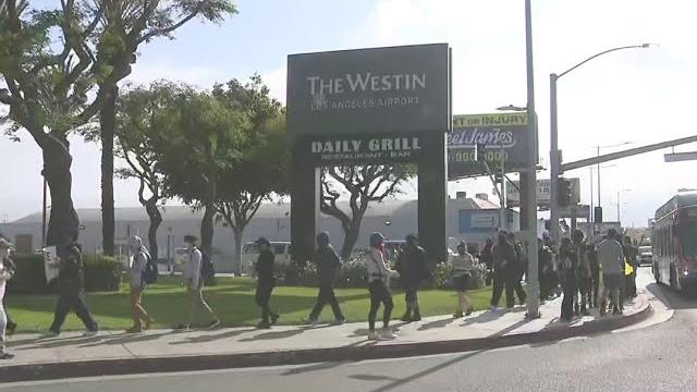 Anti-ice protesters gather outside hotel in pasadena Anti-ice protesters gather outside hotel in pasadena