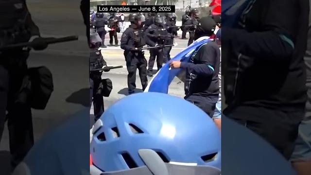 Protests over us immigration raids escalate in la Protests over us immigration raids escalate in la