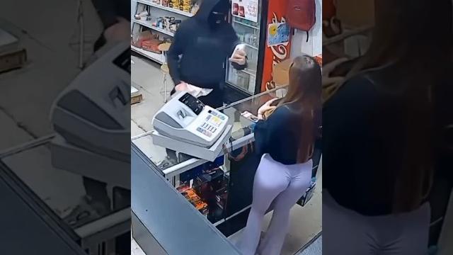 Woman flashes robber her boobs to stop the robbery Woman flashes robber her boobs to stop the robbery