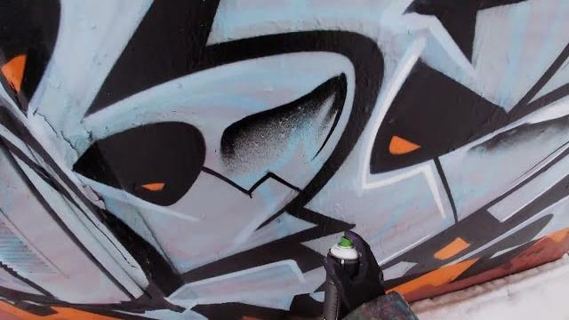 Graffiti bombing on the carriageway along the railroad tracks.one man. rebel813.color piece.2022 4k Graffiti bombing on the carriageway along the railroad tracks.one man. rebel813.color piece.2022 4k