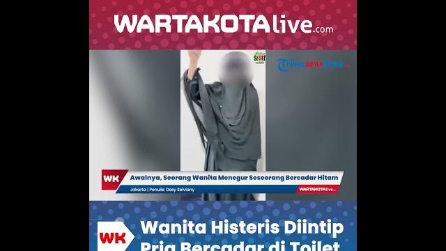 Wanita histeris diintip pria bercadar di toilet Wanita histeris diintip pria bercadar di toilet