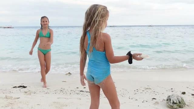 Children playing on the beach 4k Children playing on the beach 4k
