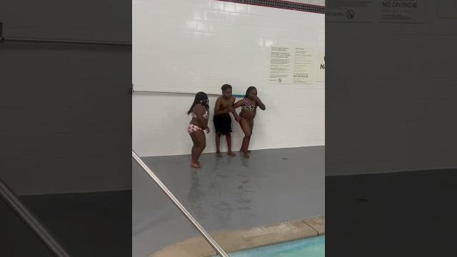Brother and sister jumps in pool #shorts Brother and sister jumps in pool #shorts