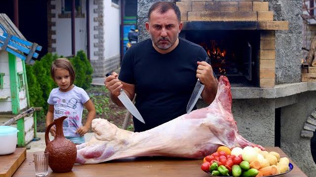 Meat in wine. lamb in an oven. roasting lamb in a country oven Meat in wine. lamb in an oven. roasting lamb in a country oven