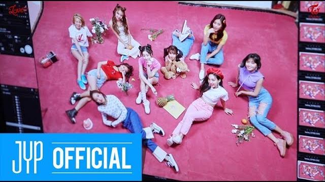 Twice "what is love?" jacket behind a Twice "what is love?" jacket behind a