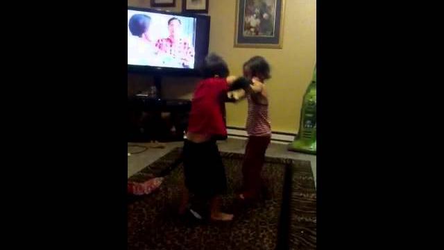 Brother and sister wrestling Brother and sister wrestling