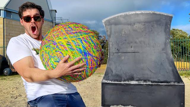 Giant rubber band ball vs. giant axe (must see slow mo!!) Giant rubber band ball vs. giant axe (must see slow mo!!)