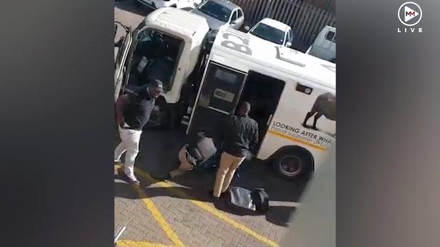 Armed cash-in-transit robbery caught on camera in pretoria Armed cash-in-transit robbery caught on camera in pretoria