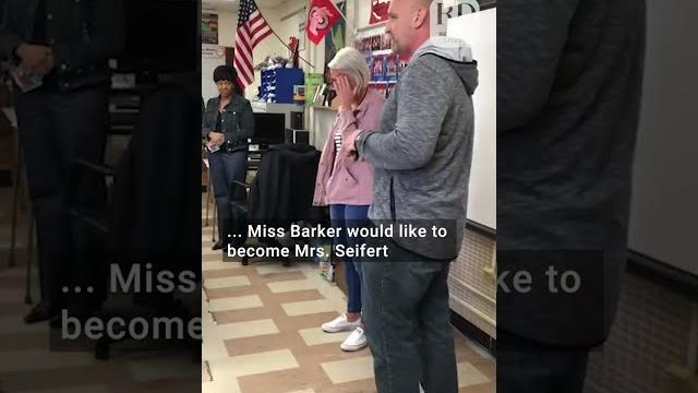Teacher proposes to another teacher in front of her class Teacher proposes to another teacher in front of her class