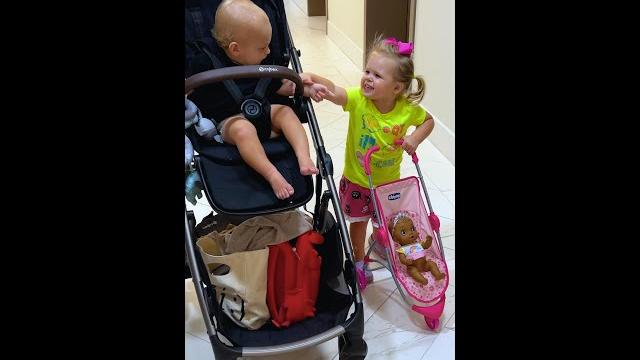 Cute naomi loves to have baby in the stroller Cute naomi loves to have baby in the stroller