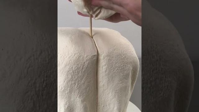 Hyperrealistic cake on a bed? Hyperrealistic cake on a bed?