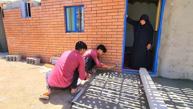 "beauty and strength: cementing the front door of abu's house with a stone and pleasant look" "beauty and strength: cementing the front door of abu's house with a stone and pleasant look"