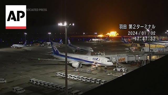 Video shows moment japan plane crashes at tokyo airport Video shows moment japan plane crashes at tokyo airport