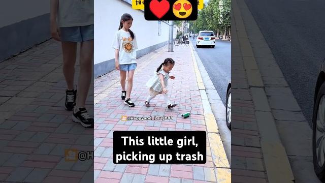 This little girl, picking up trash This little girl, picking up trash