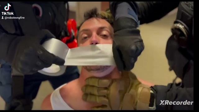 Swat man gagged duct tape guys Swat man gagged duct tape guys