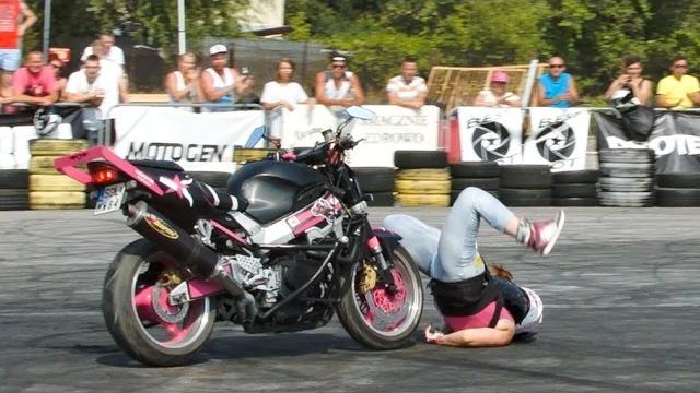 Girl stunt crash on motorcycle Girl stunt crash on motorcycle