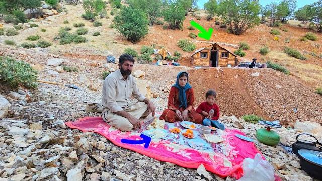 A day in the life of a nomadic mother; from building a shelter to a simple meal by the fire A day in the life of a nomadic mother; from building a shelter to a simple meal by the fire
