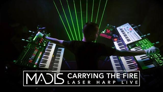 Madis - carrying the fire (laser harp live performance) Madis - carrying the fire (laser harp live performance)