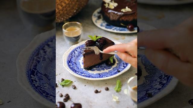 Double chocolate cheesecake w/ fresh cherry sauce #food Double chocolate cheesecake w/ fresh cherry sauce #food