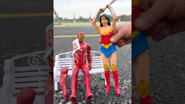 Wonder woman tests iron man's arm strength | fun toys Wonder woman tests iron man's arm strength | fun toys