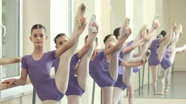 Little ballerinas doing stretching exercises at ballet | intown stars gymnastics & dance Little ballerinas doing stretching exercises at ballet | intown stars gymnastics & dance